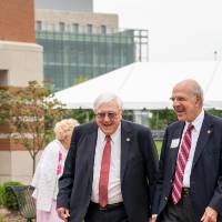 President Emeritus Arend Lubbers with a guest at the Arend and Nancy Lubbers Student Services Center Dedication